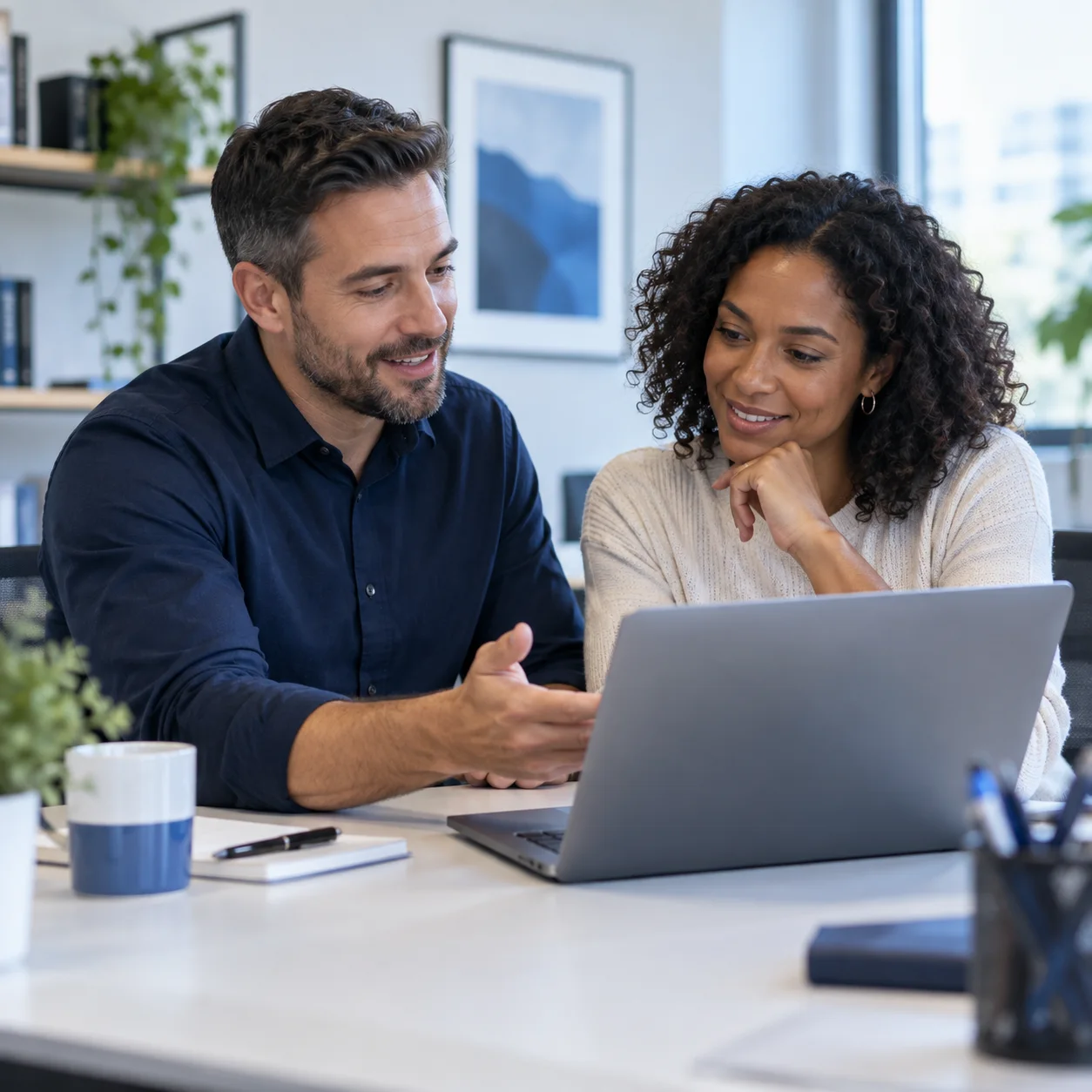 Illustration of an IT specialist helping a colleague at a laptop